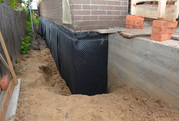 Happy homeowners after waterproofing job in Knightstown